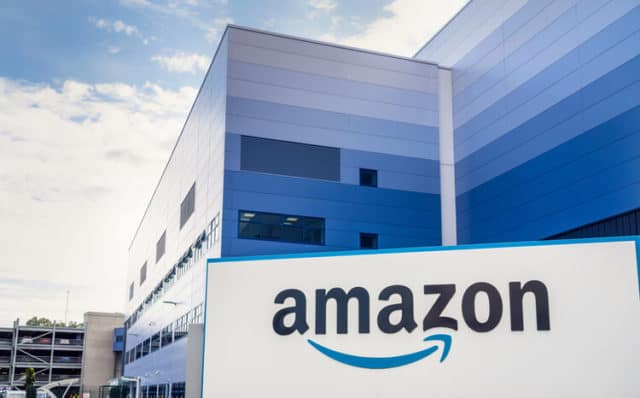 One of the Amazon office locations with the company logo in on the front signage.