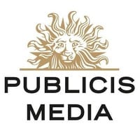 Publicis Media logo featuring a stylized golden sun with a face above the bold black text PUBLICIS MEDIA on a white background, highlighting expertise in Instacart Advertising and digital solutions.