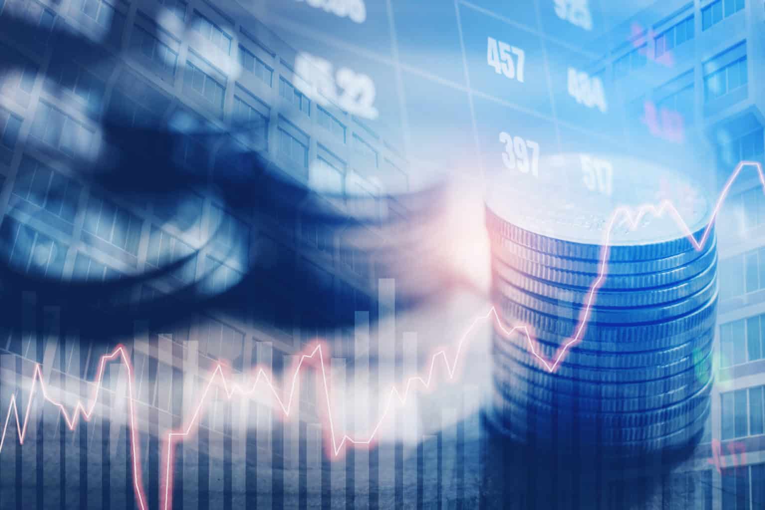 A stack of coins and a rising graph line are overlaid with blurry numbers and buildings, representing financial growth, investment, stock market trends, or effective media budget forecasting.