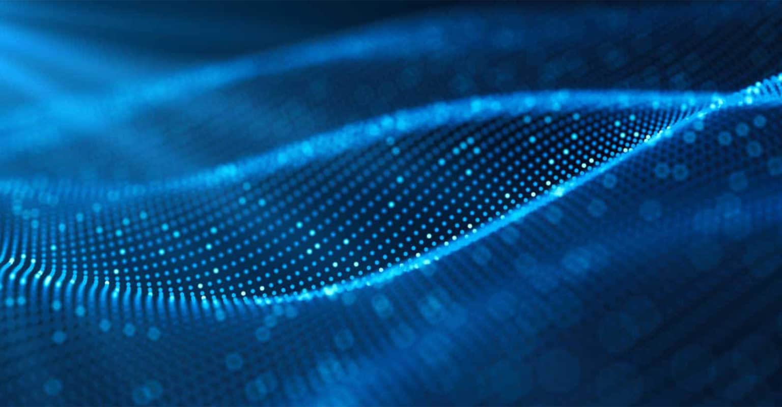 Abstract blue digital wave made of glowing dots and lines, evoking flowing movement and futuristic technology. The image suggests a dynamic, data-driven landscape—ideal for illustrating innovative Instacart Advertising software or platforms.