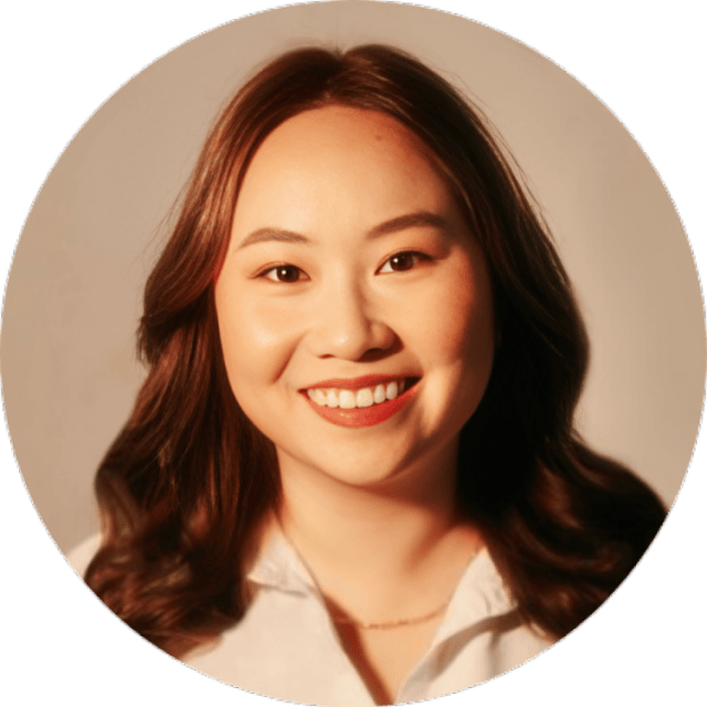 A young woman with long brown hair and a white blouse smiles warmly at the camera against a neutral background, capturing the approachable spirit behind our latest omnichannel case study.